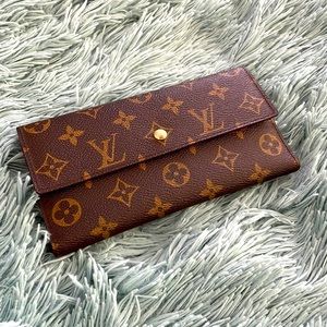 Louis Vuitton Monogram Porte Tresor International Trifold Long Wallet.